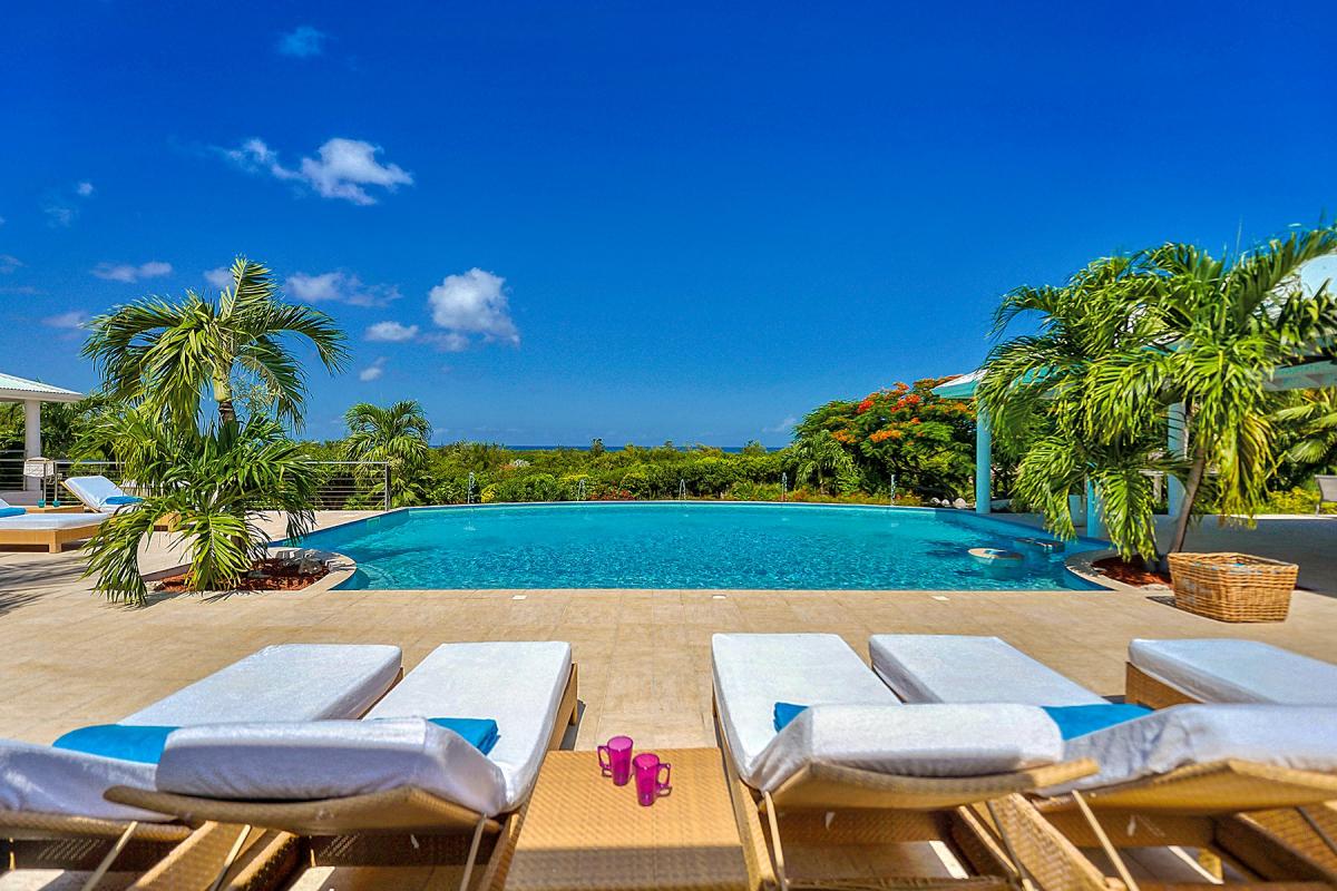 Villa Rental St Martin - Deckchairs by the pool